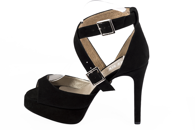 Matt black women's closed back sandals, with crossed straps. Round toe. Very high slim heel with a platform at the front. Profile view - Florence KOOIJMAN